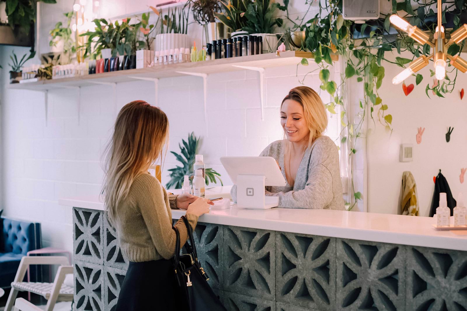 Lady in a store getting ready to make a purchase